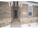 Front entrance with stone and brick details at 1157 Paul Revere Dr, Mooresville, IN 46158