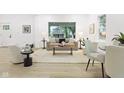 Bright living room featuring a neutral palette, a large picture window, and stylish furnishings at 3031 N New Jersey St, Indianapolis, IN 46205