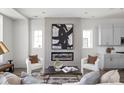 Cozy living room with a modern fireplace, stylish seating, and tasteful decor at 1659 Midland Main St, Westfield, IN 46074