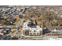Aerial view of a modern apartment building located near the city center, showing its accessibility at 1155 S Rangeline Rd # 505, Carmel, IN 46032