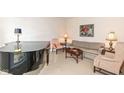 Cozy living room with elegant piano, comfortable seating, and tasteful decor at 14626 Warner Trl, Westfield, IN 46074