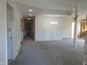 Bright living room featuring gray carpet, a chandelier, and white painted walls at 431 Vestal Rd, Plainfield, IN 46168