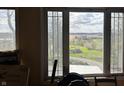Picturesque countryside view from the window, featuring a mix of lush greenery and distant structures at 7934 S 600 W, Edinburgh, IN 46124