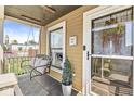 Inviting front porch featuring a swing, stylish accents, and a welcoming entrance at 1019 Central Ave, Indianapolis, IN 46202