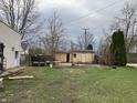 View of large backyard and separate storage building at 850 N Anderson St, Elwood, IN 46036