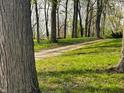 Gravel driveway through wooded area, enhancing privacy and a natural setting at 8855 N Waverly Park Rd, Martinsville, IN 46151