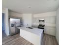 Modern kitchen featuring stainless steel appliances and an island at 2028 Foothill Dr, Greenfield, IN 46140