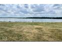Picturesque lakeside view with sailboats docked in the serene water, providing a peaceful scene at 4695 Shireton Ct, Indianapolis, IN 46254