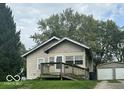 Charming single-Gathering home with covered front porch and a detached two car garage at 237 Ringwood Way, Anderson, IN 46013