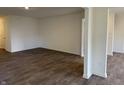 Open-concept living area with hardwood floors and neutral paint, perfect for entertaining at 11015 Walter Dr, Indianapolis, IN 46235