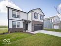 Beautiful two-story home with a brick facade and a well-kept lawn, located in a residential area at 140 Velvet Hat Rd, Danville, IN 46122