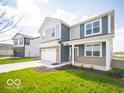Beautiful two-story home featuring a spacious lawn and a two-car garage at 146 Velvet Hat Rd, Danville, IN 46122