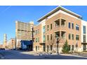 Stylish multi-story brick building with cityscape view, including a One Way sign on the corner at 504 N Park N Ave # 4, Indianapolis, IN 46202