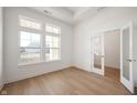 Bright, empty room with natural light and modern finishes, offering a versatile space for any need at 15846 Vitalize Run, Fishers, IN 46040