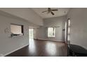 Open living room with soaring ceilings and hardwood floors at 5325 Bluff View Dr, Indianapolis, IN 46217