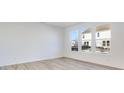 Spacious living room with hardwood floors and large windows at 1116 Bevy Blvd, Danville, IN 46122