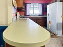 Functional kitchen featuring a breakfast bar, ample counter space, and modern appliances at 3305 N Keystone Ave, Indianapolis, IN 46218