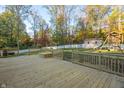 Spacious deck overlooks backyard with playset and shed at 7709 Elk Dr, Nineveh, IN 46164