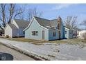 Rear view of renovated blue house, highlighting its charming design at 405 E 9Th St, Sheridan, IN 46069