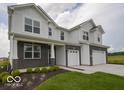 Attractive two-story home with a combination brick and white siding exterior at 236 Sam Himsel Way, Danville, IN 46122