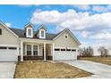 Exterior view featuring a well-manicured lawn, showcasing the inviting curb appeal of this charming residence at 18415 Depoe Ln, Westfield, IN 46074
