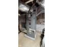 Close-up of a modern furnace unit in the basement at 180 N Highland St, Morgantown, IN 46160