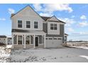 Charming two-story home featuring a covered porch, white trim and a two car garage at 4193 Bozeman Way, Bargersville, IN 46106