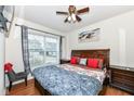 Spacious bedroom with a king-size bed and large window at 6252 Sugar Maple Dr, Zionsville, IN 46077