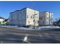 Modern three-story townhomes under construction on a corner lot at 251 N Temple Ave, Indianapolis, IN 46201