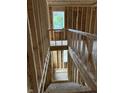 Under construction home's framed staircase with visible upper level at 1924 N Lesley Ave, Indianapolis, IN 46218