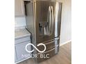 Side-by-side stainless refrigerator with water and ice dispenser at 1439 Wigwam Ln, Martinsville, IN 46151