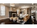Spacious living room with fireplace, hardwood floors, and stylish furniture at 2016 Central Ave, Indianapolis, IN 46202
