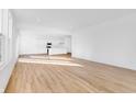 Bright, open floor plan with light wood flooring and lots of natural light from windows at 1095 Bevy Blvd, Danville, IN 46122