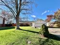 Charming one story home with brick and siding, manicured lawn and mature shade tree at 562 Nelson Dr, Brownsburg, IN 46112