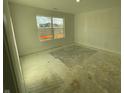 Unfinished bedroom with large window and bare floor at 6623 Sulgrove Pl, Indianapolis, IN 46221