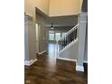 Inviting foyer with hardwood floors and staircase leading to the upper level of the home at 14914 Annabel Ct, Westfield, IN 46074