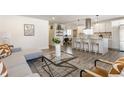 Open concept living space with modern kitchen and stylish living room at 1529 Harlan St, Indianapolis, IN 46203