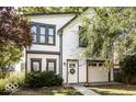 Well-maintained home with a two-car garage and neatly trimmed landscaping at 545 Fletcher Ave, Indianapolis, IN 46203