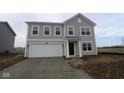 Two-story house with gray siding, white garage door, and a small front yard at 3912 Highcrest Rd, Indianapolis, IN 46239
