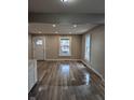 Bright living room featuring new floors and large windows at 424 N Kealing Ave, Indianapolis, IN 46201