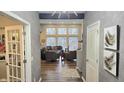 Bright and spacious entryway with hardwood floors and views into the living room at 1372 N Stoney Brook, Greenfield, IN 46140