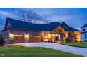 Stunning two-story home with a three-car garage and landscaped front yard at 1372 N Stoney Brook, Greenfield, IN 46140