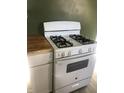 White kitchen stove and butcher block countertop at 4502 Evanston Ave, Indianapolis, IN 46205