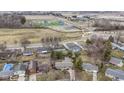 This home features an aerial view of a suburban neighborhood with sports complex and other amenities at 1024 N Michigan St, Greenfield, IN 46140
