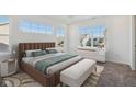 Cozy bedroom features natural light, stylish decor, and a comfortable bed at 1795 N Rapids Ct, Greenfield, IN 46140