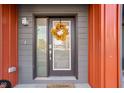 Stylish front door with glass panels and a fall-themed wreath at 1825 N New Jersey St, Indianapolis, IN 46202