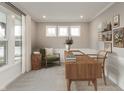 Cozy home office with natural light, modern decor, and a comfortable workspace at 6973 Oakdale Ln, Avon, IN 46123
