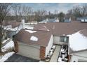 Aerial view of house, showing garage and walkway at 3422 Admiralty Ln, Indianapolis, IN 46240