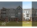 View of several new townhomes, with brick accents and various siding colors at 7348 W County Road 600 Rd # 12-604, McCordsville, IN 46055