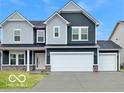 Charming two-story home with a two-car garage and stylish blue and gray siding at 67 Sterling Pl, New Whiteland, IN 46184